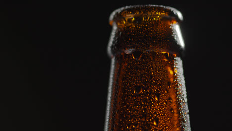 Close-Up-Of-Condensation-Droplets-On-Neck-Of-Bottle-Of-Cold-Beer-Or-Soft-Drink